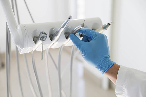 Professional Invisalign Clear Aligners technician working in Moore, OK